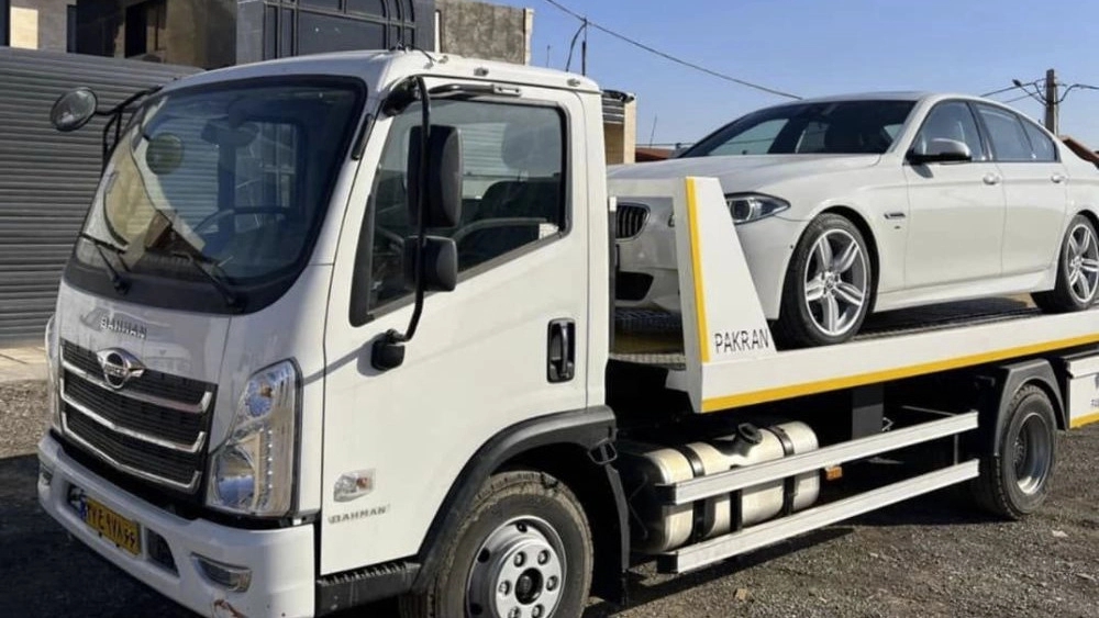 Kerman tow truck and Yazidi car rescue with wheel sole